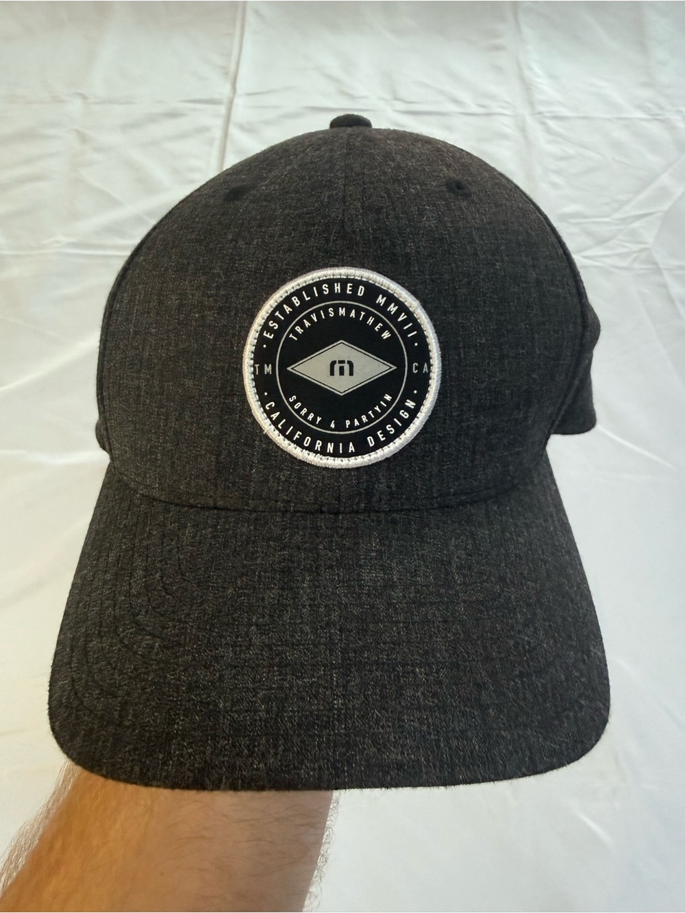 Travis Mathew Black Heather SnapBack Hat
